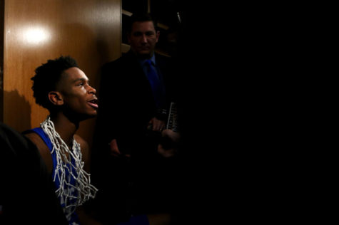 Kentucky freshman guard Shai Gilgeous-Alexander talks to media in the locker room after the win against Tennessee in the SEC tournament championship on Sunday, March 11, 2018, in St. Louis, Missouri. Kentucky defeated Tennessee 77-72. Photo by Arden Barnes | Staff
