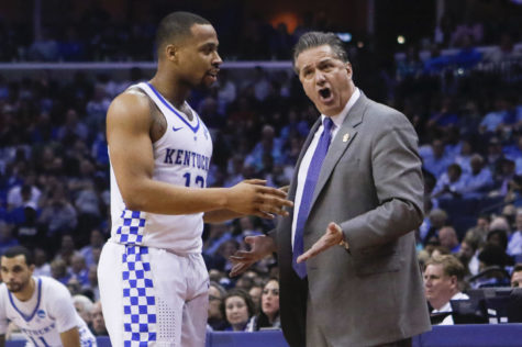 Kentucky Wildcats guard Isaiah Briscoe calms down head coach John Calipari as he reacts to a call during the 2017 NCAA Mens Basketball Tournament South Regional Sweet 16 at FedExForum on Friday, March 24, 2017 in Memphis, KY. Photo by Addison Coffey | Staff.