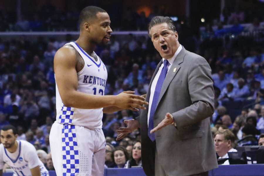 Kentucky Wildcats guard Isaiah Briscoe calms down head coach John Calipari as he reacts to a call during the 2017 NCAA Mens Basketball Tournament South Regional Sweet 16 at FedExForum on Friday, March 24, 2017 in Memphis, KY. Photo by Addison Coffey | Staff.