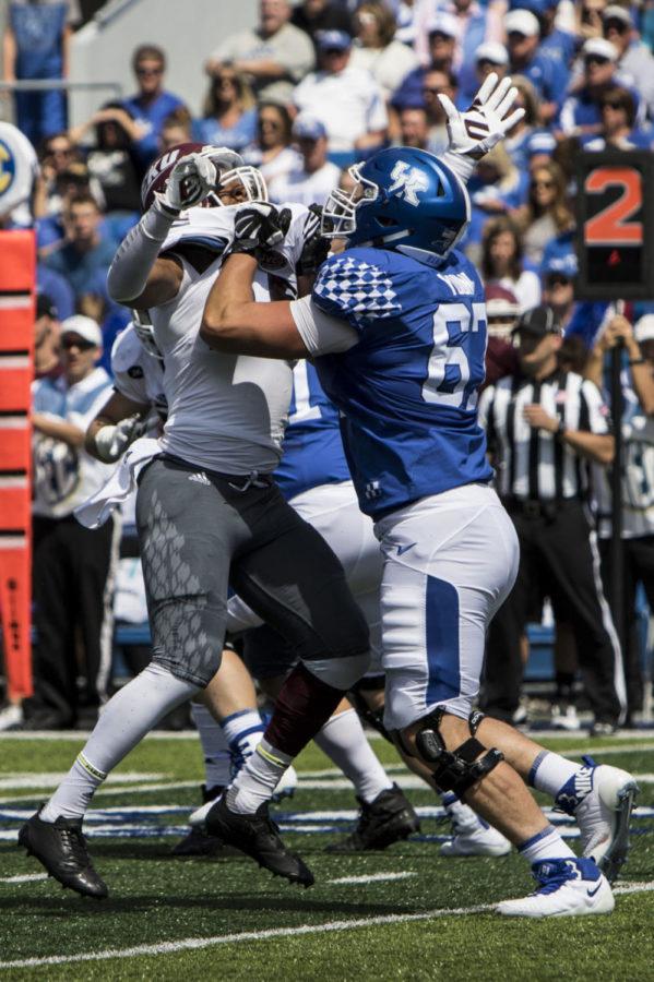 Landon Young #67 of the Kentucky Wildcats blocks an EKU Defensive Lineman during the game against EKU on Saturday, September 9, 2017 in Lexington, Ky. Kentucky defeated EKU 27 to 16. Photo by Arden Barnes | Staff