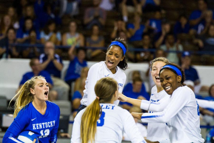 Junior Outside Hitter Leah Edmond celebrates with teammates during UKs game against Utah on Friday, August 25, 2017 in Lexington, Ky. Photo by Jordan Prather | Staff