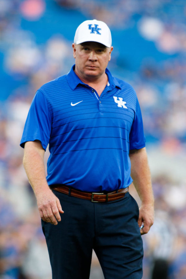 Head Coach Mark Stoops watches his players on the field during Kentucky Footballs Blue-White Spring Game on Friday, April 13, 2018 in Lexington, Ky. Photo by Jordan Prather | Staff