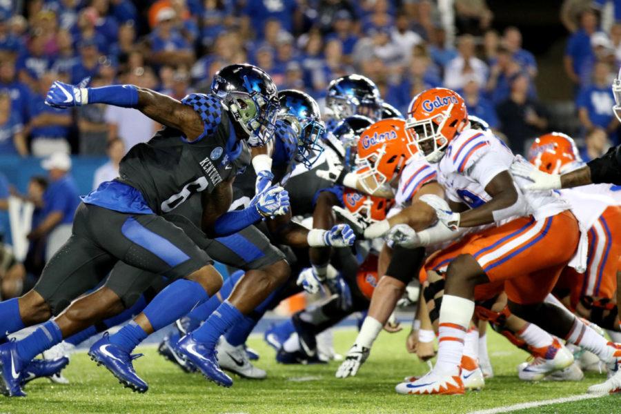 The Kentucky defense rushes off the line during the game against the University of Florida on Saturday, September 23, 2017 in Lexington, Ky. Kentucky was defeated 28-27. Photo by Chase Phillips | Staff