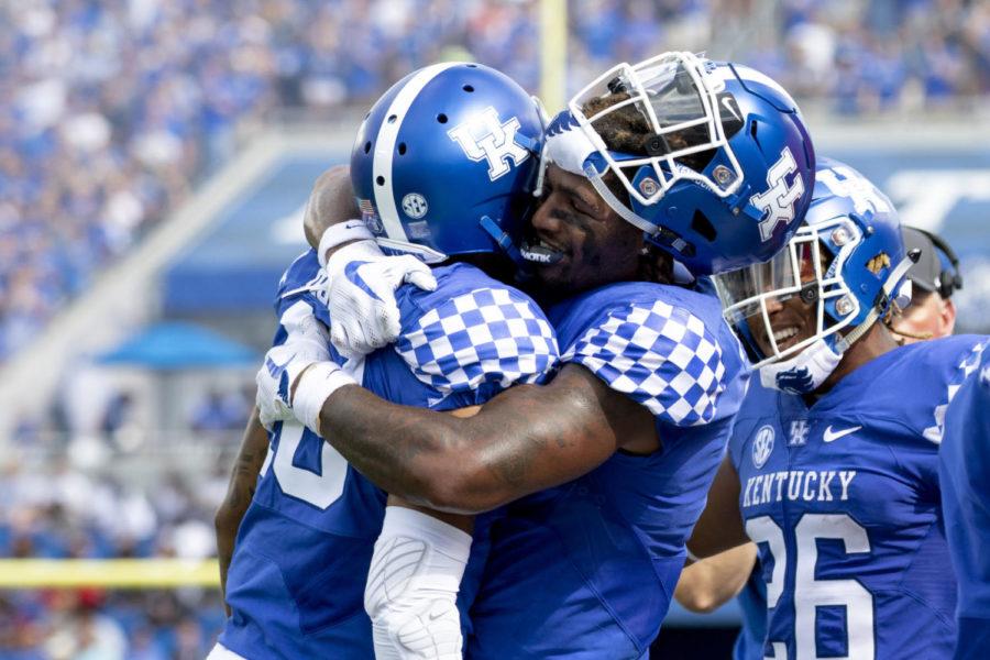 Kentucky+Wildcats+wide+receiver+Dorian+Baker+%282%29+hugs+Kentucky+Wildcats+running+back+Asim+Rose+%2810%29+prior+to+his+touchdown+during+the+game+against+Central+Michigan+on+Saturday+Sept.+1%2C+2018%2C+at+Kroger+Field+in+Lexington%2C+Kentucky.+Kentucky+won+35-20.+Photo+by+Arden+Barnes+%7C+Staff