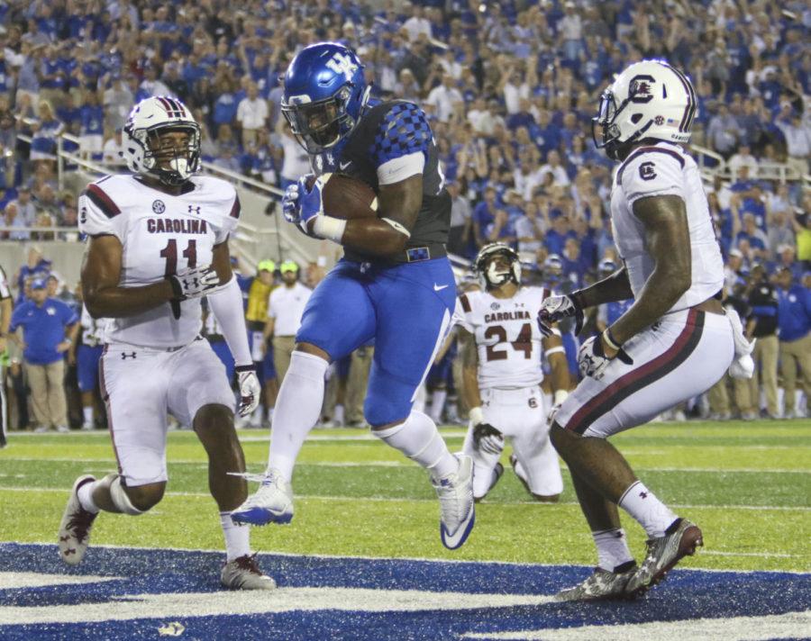 Benny+Snell+rushes+for+the+Kentucky+touchdown+during+the+Wildcats+game+against+the+South+Carolina+Gamecocks+at+Commonwealth+Stadium+on+Sept.+24%2C+2016+in+Lexington%2C+Kentucky.