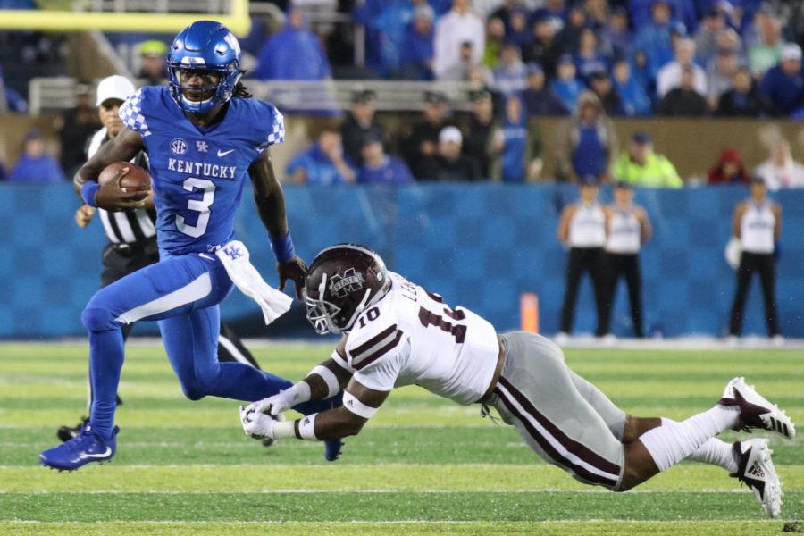 Terry Wilson breaks a tackle during the game against Mississippi State on Saturday, September 22, 2018 in Lexington, Ky. Photo by Chase Phillips | Staff