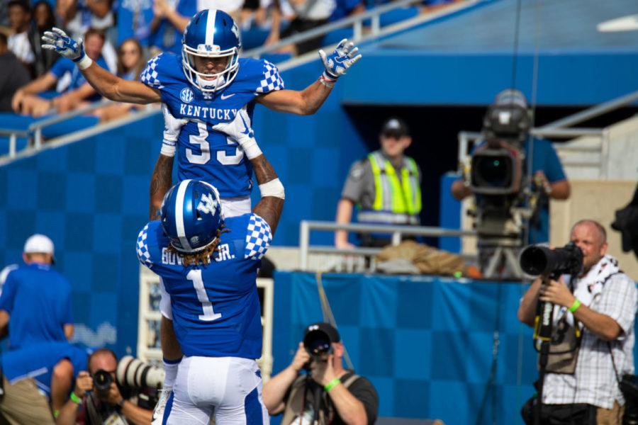 Kentucky+Wildcats+wide+receiver+David+Bouvier+%2833%29+is+lifted+up+by+wide+receiver+Lynn+Bowden+Jr.+%281%29+in+the+end-zone+after+a+touchdown+during+the+game+against+Central+Michigan+on+Saturday%2C+Sept.+1%2C+2018%2C+in+Lexington%2C+Kentucky.+Kentucky+won+35-20.+Photo+by+Jordan+Prather+%7C+Staff