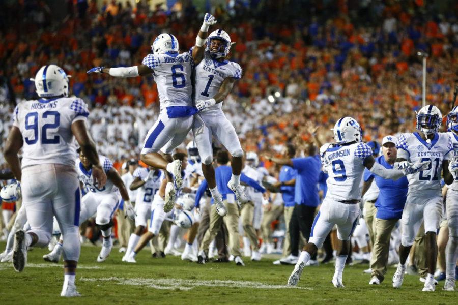 Kentucky Wildcats wide receiver Lynn Bowden Jr. (1) and Kentucky Wildcats cornerback Lonnie Johnson Jr. (6) celebrated late in the fourth quarter during their game against the Florida Gators Saturday at Ben Hill Griffin Stadium in Gainesville. Kentucky beat Florida 27-16. Photo provided by Alex Slitz | Lexington Herald-Leader