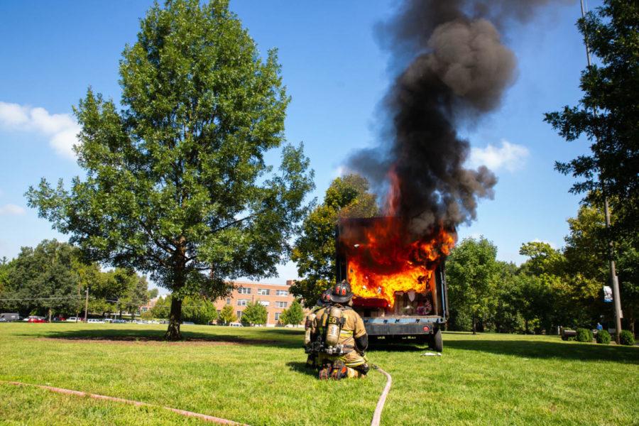 University of Kentucky Fire Marshals conduct a dorm fire demonstration on the main lawn on Thursday, Sept. 13, 2018, in Lexington, Kentucky. Photo by Jordan Prather | Staff