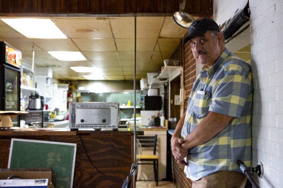 Phillip’s Market owner Gordon Bentley stands between the kitchen and front counter of Phillip’s Market on Monday, Sept. 7, 2018, in Lexington, Kentucky. Photo by Arden Barnes | Staff