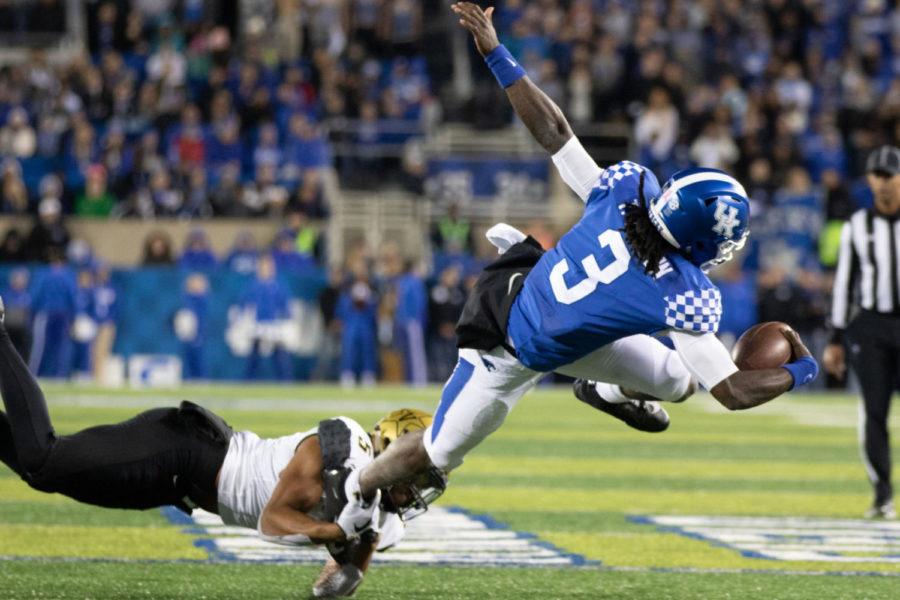 Kentucky+Wildcats+quarterback+Terry+Wilson+%283%29+being+tackled+by+a+defensive+Vanderbilt+player.+University+of+Kentucky+football+defeated+Vanderbilt+University+14-7+to+become+6-1+on+the+season+on+Saturday%2C+October+20%2C+2018+at+Kroger+Field+in+Lexington%2C+Kentucky.+Photo+by+Michael+Clubb+%7C+Staff