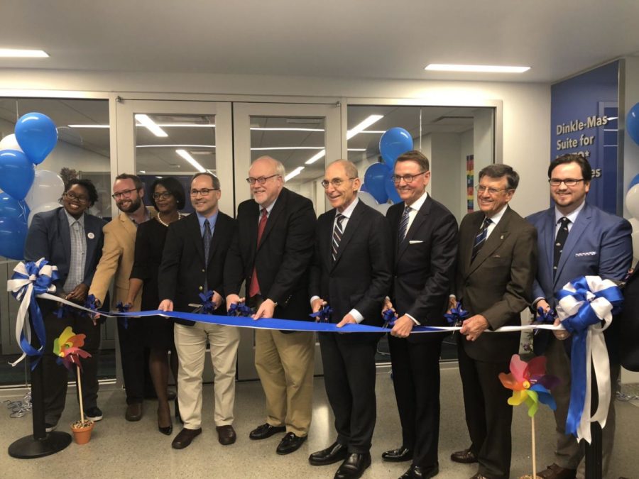 Members of the UK administration and Lexington Mayor Jim Gray are joined by LGBTQ advocates on Oct. 12, 2018 to unveil UKs new Dinkle-Mas Suite for LGBTQ Resources.