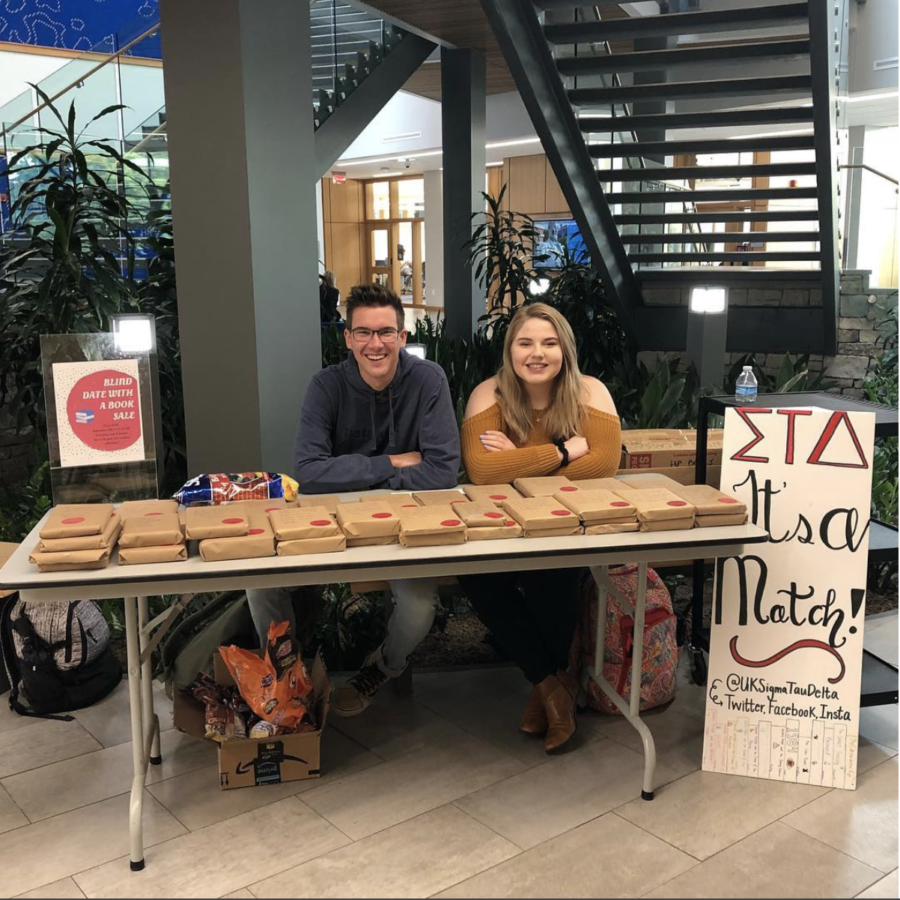 Members of Sigma Tau Delta welcomed students to take a chance on a mystery read.