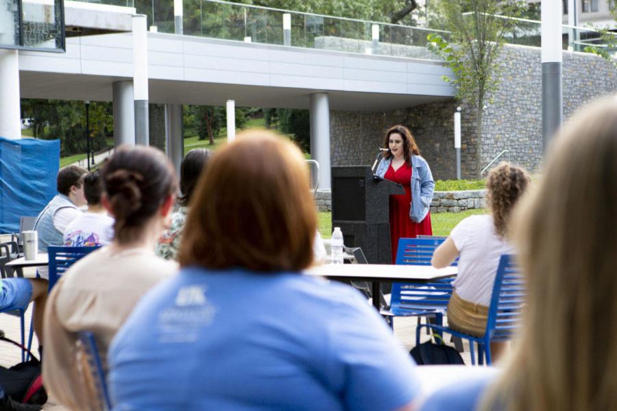 Senior Emily Cole speaks during a vigil held for assault survivors outside the Gatton Student Center on UKs campus on Friday, Oct. 5, 2018 in Lexington, Kentucky. Photo by Arden Barnes | Staff