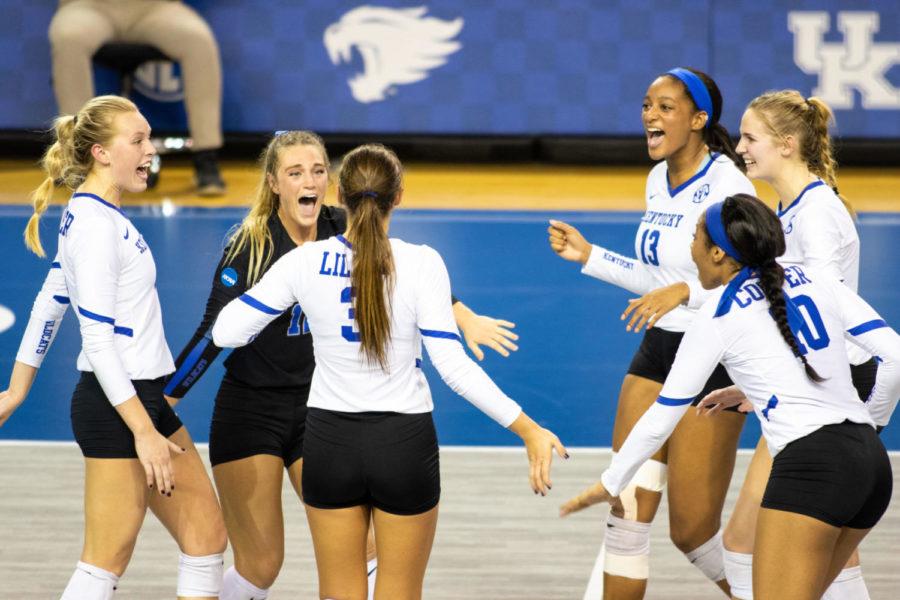 Kentucky+volleyball+players+celebrate+a+point+during+the+match+against+Florida+on+Wednesday%2C+Oct.+31%2C+2018+at+Memorial+Coliseum+in+Lexington%2C+Kentucky.+Kentucky+swept+the+Gators+winning+the+first+three+sets.+Photo+by+Jordan+Prather+%7C+Staff