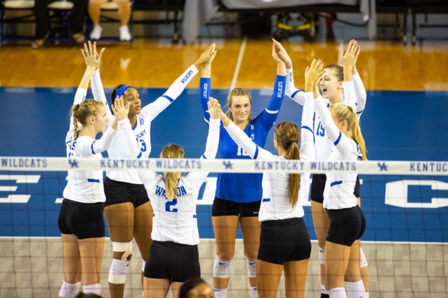 The Kentucky volleyball team huddles up before the start of a set during the game against Arkansas on Friday, Sept. 28, 2018 at Memorial Coliseum in Lexington, Ky. Kentucky swept the first three sets to win the match. Photo by Jordan Prather | Staff