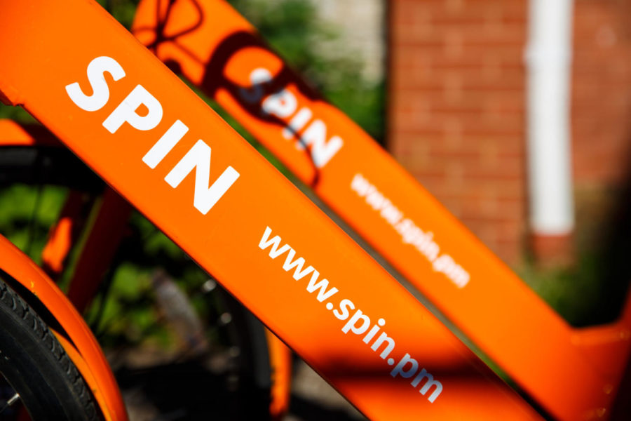 Spin bikes are parked in random locations all over UKs campus and the surrounding area. Photo by Jordan Prather | Staff
