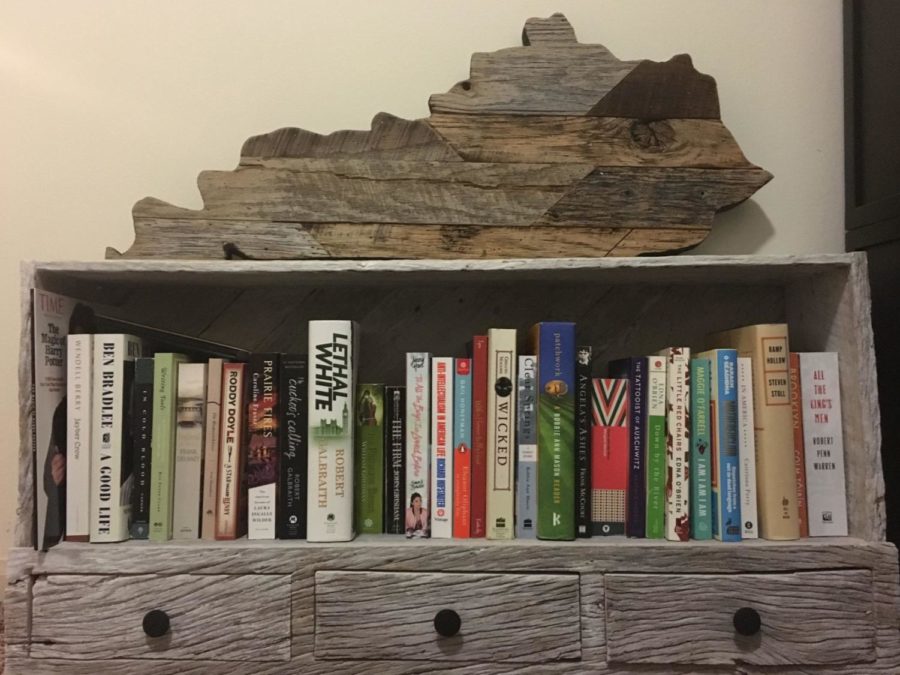 Editor-in-chief+Bailey+Vandivers+personal+bookshelf+with+decorative+state+of+Kentucky.