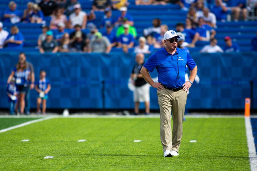 Kentucky Wildcats head coach Mark Stoops watches as his players warm up prior to the game against Murray State on Saturday, Sept. 15, 2018, in Lexington, Kentucky. Kentucky defeated Murray 48-10. Photo by Jordan Prather | Staff