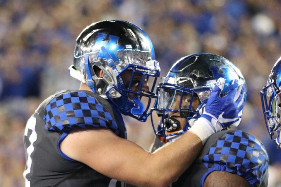 CJ+Conrad+and+Benny+Snell+Jr.+celebrate+a+touchdown+during+the+game+against+South+Carolina+on+Saturday%2C+September+29%2C+2018+in+Lexington%2C+Ky.+Photo+by+Chase+Phillips+%7C+Staff