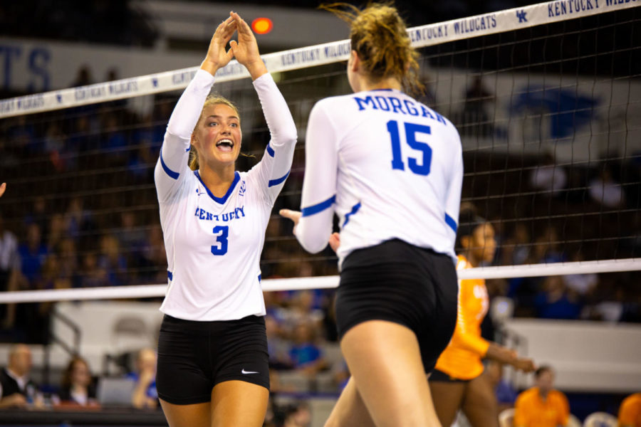 Sophomore Madison Lilley and senior Brooke Morgan celebrate a point during the game against Tennessee on Thursday, Oct. 10, 2018 at Memorial Coliseum in Lexington, Ky. Kentucky won 3 sets to 1. Photo by Jordan Prather | Staff