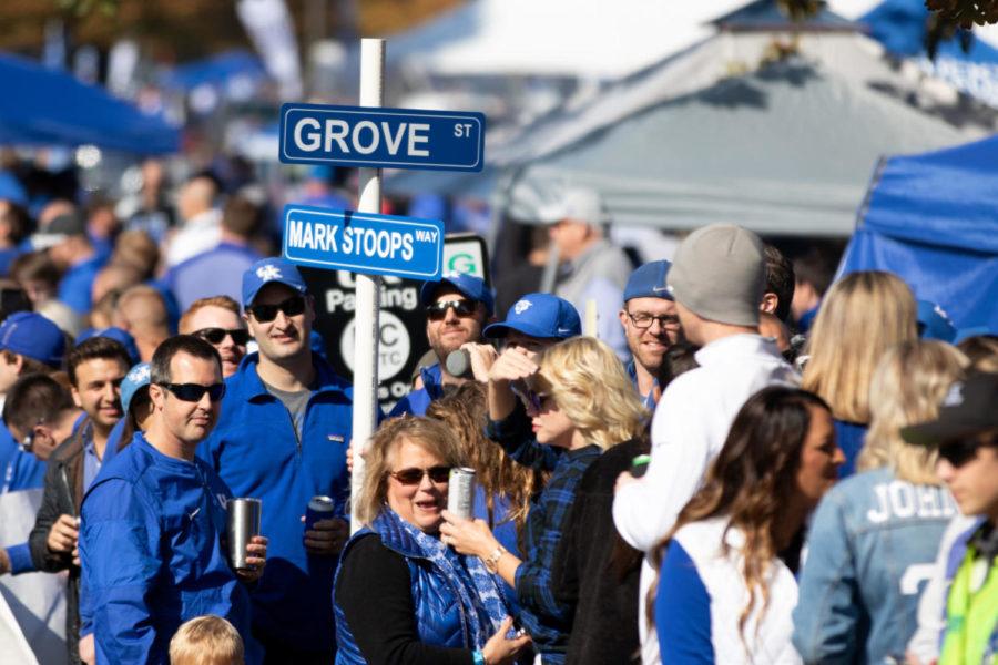 Fans hold up signs during Cat Walk. University of Kentucky football players and coaches greeted fans during Cat Walk before their game against No. 6 Georgia at Kroger Field on Saturday, November 3, in Lexington, Kentucky. Photo by Michael Clubb | Staff