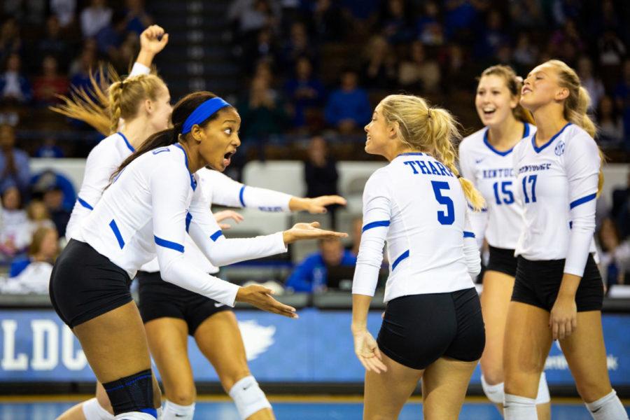 Kentucky junior Leah Edmond and freshman Lauren Tharp celebrate a point scored during the game against Mississippi State on Friday, Nov. 9, 2018 at Memorial Coliseum in Lexington, Kentucky. Kentucky won in the first three sets. Photo by Jordan Prather | Staff