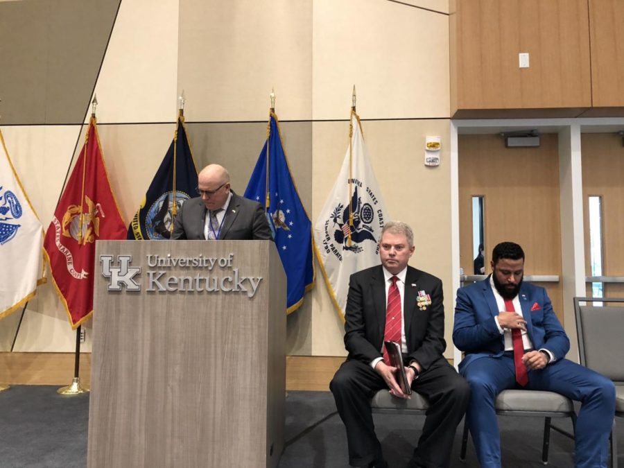 UK Provost David Blackwell joins Director of Veterans Resource Center Tony Dotson and UK student Eric Haley during the universitys Veterans Day observance on Nov. 9, 2018 in Lexington, Ky.