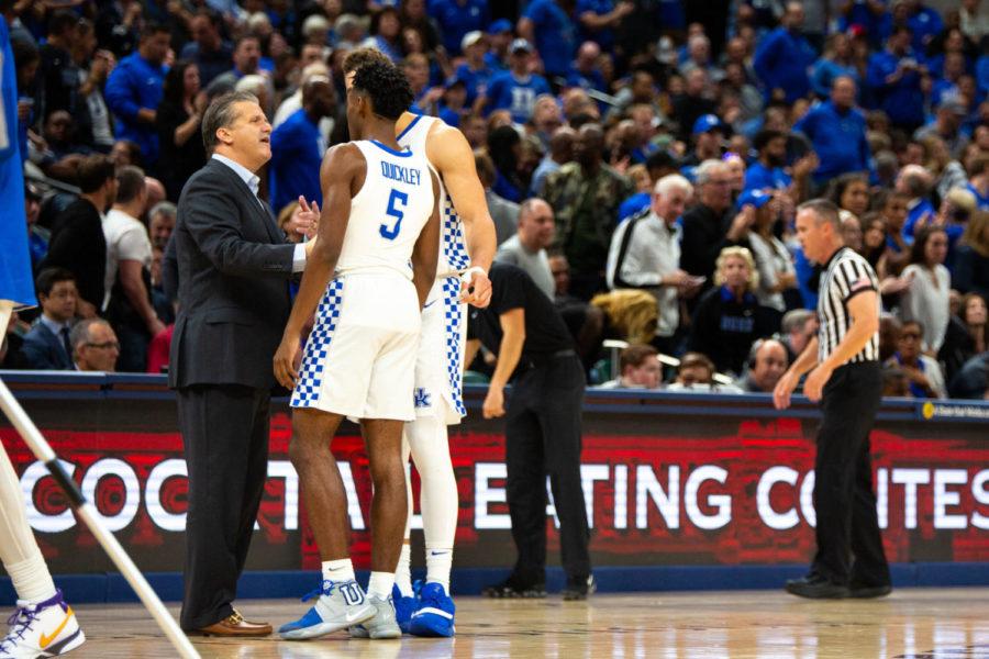 Kentucky head coach John Calipari talks with freshman guard Immanuel Quickley and graduate student forward Reid Travis during the game against Duke in the State Farm Champions Classic on Tuesday, Nov. 6, 2018, at Bankers Life Fieldhouse in Indianapolis, Indiana. Photo by Jordan Prather | Staff