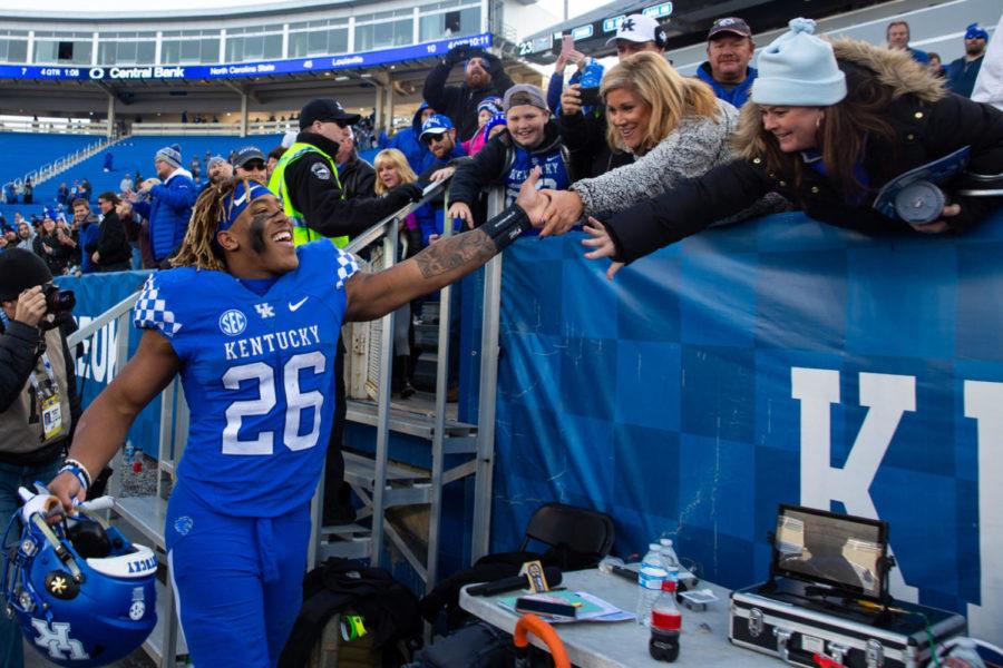 Kentucky Wildcats running back Benny Snell Jr. (26) walks over to the stands to meet with some fans following the game against Middle Tennessee on Saturday, Nov. 17, 2018, at Kroger Field in Lexington, Kentucky. Kentucky won 34-23. Photo by Jordan Prather | Staff