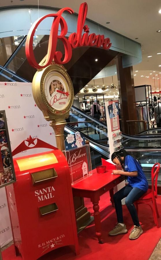 A Believe station inside Macys where children can mail letters to Santa. 