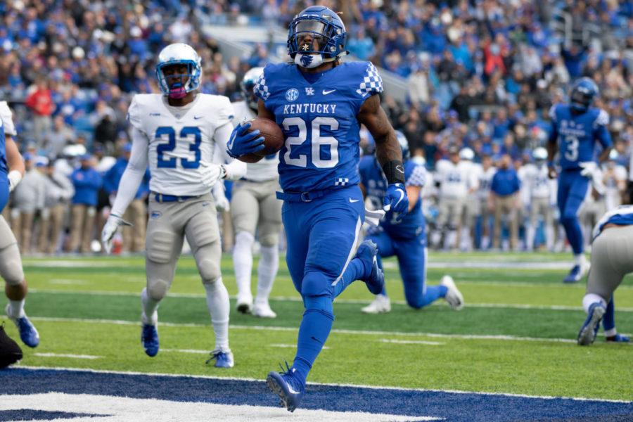 Kentucky Wildcats running back Benny Snell Jr. (26) running the ball into the end zone for a touchdown. University of Kentucky football defeated Middle Tennessee State University 34-23 at Kroger Field on Saturday, Nov. 17, 2018 in Lexington, Kentucky. Photo by Michael Clubb | Staff