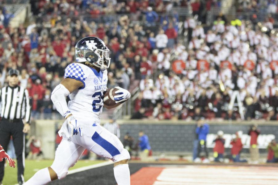 Kentucky+Wildcats+running+back+Benny+Snell+Jr.+%2826%29+runs+in+his+second+touchdown+during+a+56-10+Kentucky+win+over+the+University+of+Louisville+in+Cardinal+Stadium+on+Saturday%2C+Nov.+24%2C+2018%2C+in+Louisville%2C+Kentucky.+Photo+by+Rick+Childress+%7C+Staff