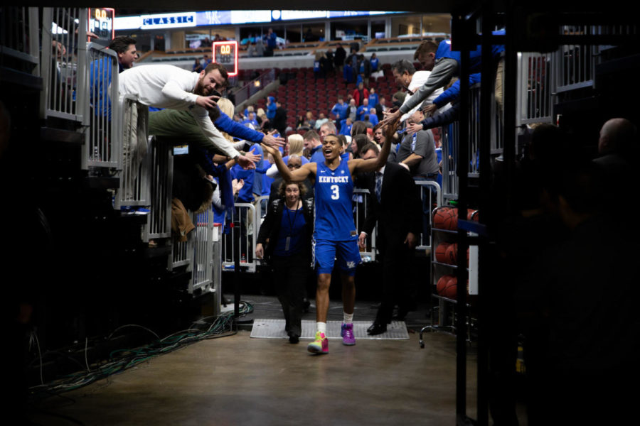 Freshman guard Keldon Johnson is greeted by fans while walking off the court after the game. University of Kentucky men's basketball team defeated University of North Carolina 80-72 in the CBS Sports Classic at the United Center on Saturday, December 22, 2018 in Chicago, Illinois. Photo by Michael Clubb | Staff