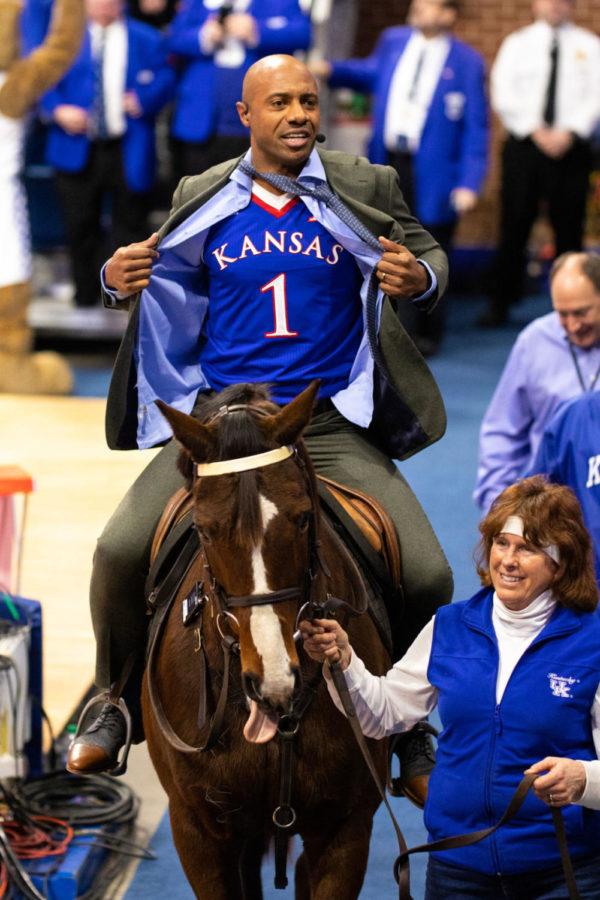 Jay Williams exits the arena riding a horse while wearing a Kansas jersey during ESPN College GameDay on Saturday, Jan. 26, 2019, at Rupp Arena in Lexington, Kentucky. Kentucky basketball will take on the Kansas Jayhawks at 6:00 PM. Photo by Jordan Prather | Staff