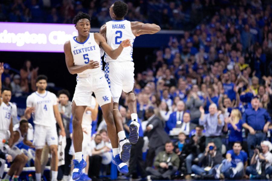 Freshman guard Immanuel Quickley and Freshman guard Ashton Hagans celebrate after Hagans scores a three pointer. University of Kentucky mens basketball team defeated Vanderbilt University 56-47 at Rupp Arena on Saturday, January 12, 2019, in Lexington, Kentucky. Photo by Michael Clubb | Staff