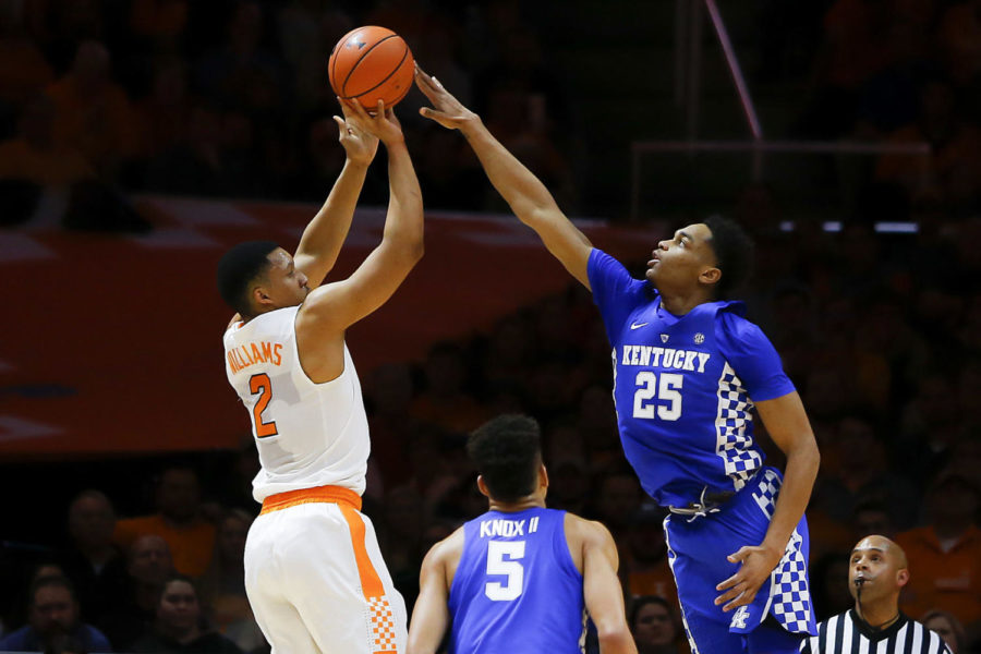 Kentucky Wildcats forward PJ Washing blocks Tennessee Volunteer forward Grant Williams shot during the first half of the game against the Tennessee Volunteers at Thompson-Boling Arena on Saturday, January 6, 2017 in Knoxville, TN. Photo by Addison Coffey | Staff.
