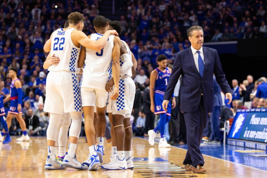 Kentucky players huddle up as head coach John Calipari walks back to the bench during the game against Kansas on Saturday, Jan. 26, 2019, at Rupp Arena in Lexington, Kentucky. Kentucky won with a final score of 71-63. Photo by Jordan Prather | Staff