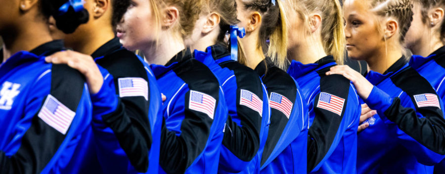 Kentucky gymnasts line up for the singing of the national anthem before the meet against Alabama on Friday, Feb. 22, 2019, at Memorial Coliseum in Lexington, Kentucky. Kentucky defeated Alabama 197.200 to 196.800. Photo by Jordan Prather | Staff
