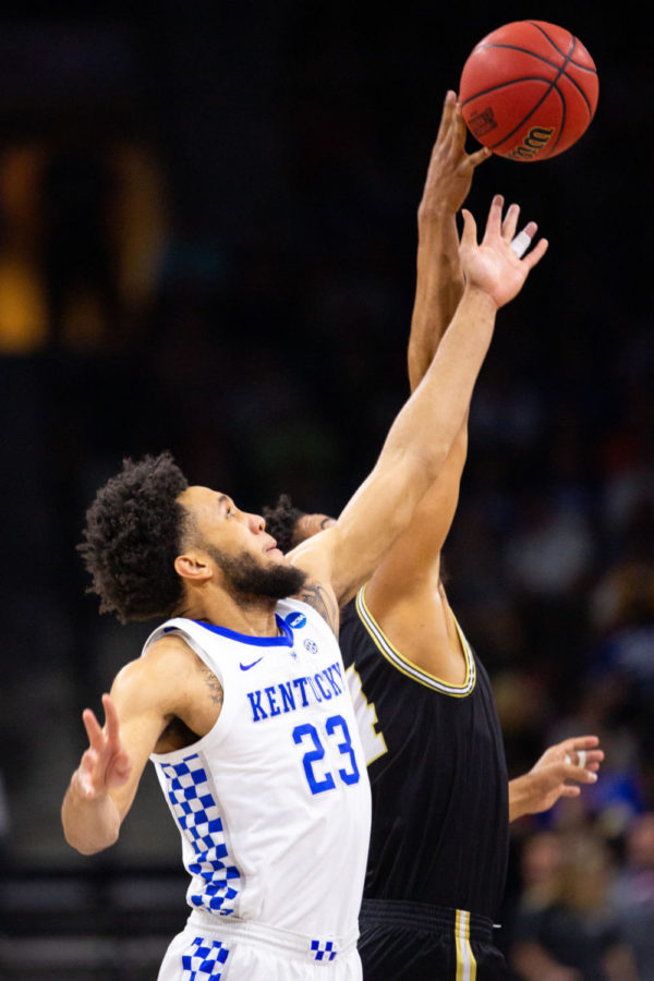 Kentucky freshman forward EJ Montgomery reaches for the ball during the tip-off of the game against Wofford in the second round of the NCAA tournament on Saturday, March 23, 2019, at VyStar Veterans Memorial Arena in Jacksonville, Florida. Kentucky won 62-56. Photo by Jordan Prather | Staff