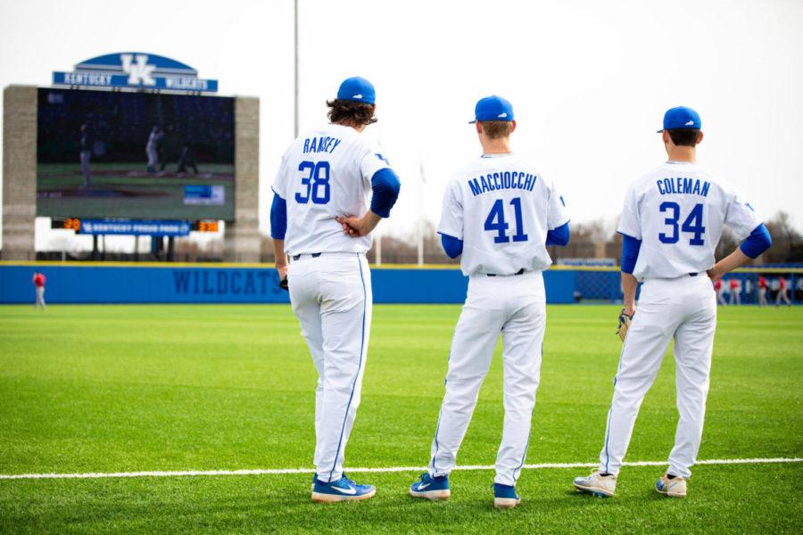Kentucky sophomore Jimmy Ramsey, redshirt junior Grant Macciocchi and redshirt sophomore Carson Coleman watch highlights from their previous game on the video board before the game against SIUE on Tuesday, March 12, 2019, at Kentucky Proud Park in Lexington, Kentucky. Kentucky won 6-4. Photo by Jordan Prather | Staff