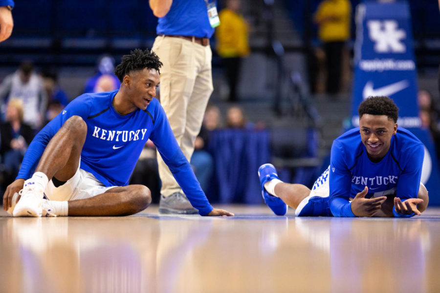 Kentucky freshman guards Immanuel Quickley (left) and Ashton Hagans (right) talk as they stretch before the game against Florida on Saturday, March 9, 2019, at Rupp Arena in Lexington, Kentucky. Kentucky won 66-57. Photo by Jordan Prather | Staff