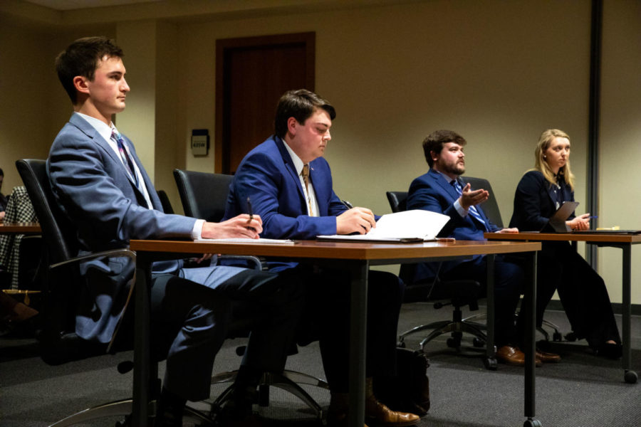 (left to right) Candidates for SGA vice president, Andy Flood, and president, Tucket Lovett, listen as current president Michael Hamilton and director of government relations Katherine Speece voice their concerns to the judicial panel on Wednesday, Feb. 13, 2019, at the Gatton College of Business in Lexington, Kentucky. Photo by Jordan Prather | Staff