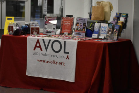 The AVOL information table had condoms, candies and other free goodies for students at the Cats Den drag show on Thursday, February 28, 2019 in Lexington, Kentucky. Photo by Natalie Parks | Staff