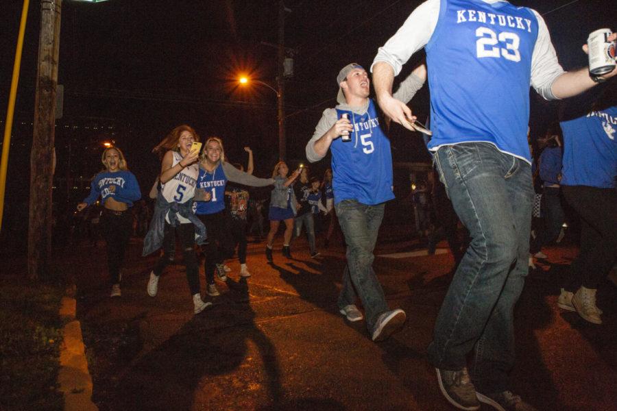 Kentucky fans celebrate on State Street after Kentuckys Sweet Sixteen win against Houston on Friday, March 29, 2019, in Lexington, Kentucky. Kentucky defeated Houston 62-58, pushing Kentucky into the Elite Eight game against Auburn. Photo by Arden Barnes | Staff