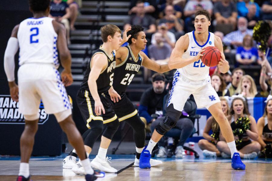 Kentucky graduate student forward Reid Travis passes the ball to freshman guard Ashton Hagans during the game against Wofford in the second round of the NCAA tournament on Saturday, March 23, 2019, at VyStar Veterans Memorial Arena in Jacksonville, Florida. Photo by Jordan Prather | Staff