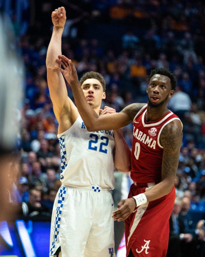 Kentucky graduate student forward Reid Travis takes a shot during the SEC tournament quarterfinals game against Alabama on Friday, March 15, 2019, at Bridgestone Arena in Nashville, Tennessee. Photo by Jordan Prather | Staff