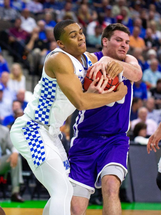 Kentucky freshman guard Keldon Johnson fights for possession during the game against Abilene Christian in the first round of the NCAA tournament on Thursday, Mar. 21, 2019, at VyStar Veterans Memorial Arena in Jacksonville, Florida. Kentucky won 79-44. Photo by Jordan Prather | Staff