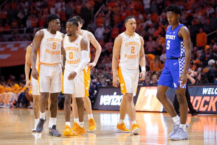 UT's team walks down the court while Immanuel Quickly walks by. UK men's basketball team lost to Tennessee 71-52 at Thompson Bowling Arena on Saturday, March 2, 2019, in Knoxville, Tennessee. Photo by Michael Clubb | Staff