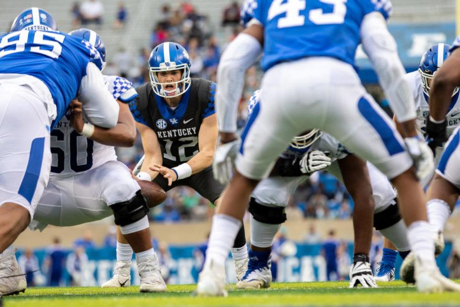 Kentucky Wildcats quarterback Gunnar Hoak (12) anticipates the snap. University of Kentucky’s football team played their annual spring game on Friday, April 12, 2019 at Kroger Field. The Blue team won 64-10. Photo by Michael Clubb | Staff